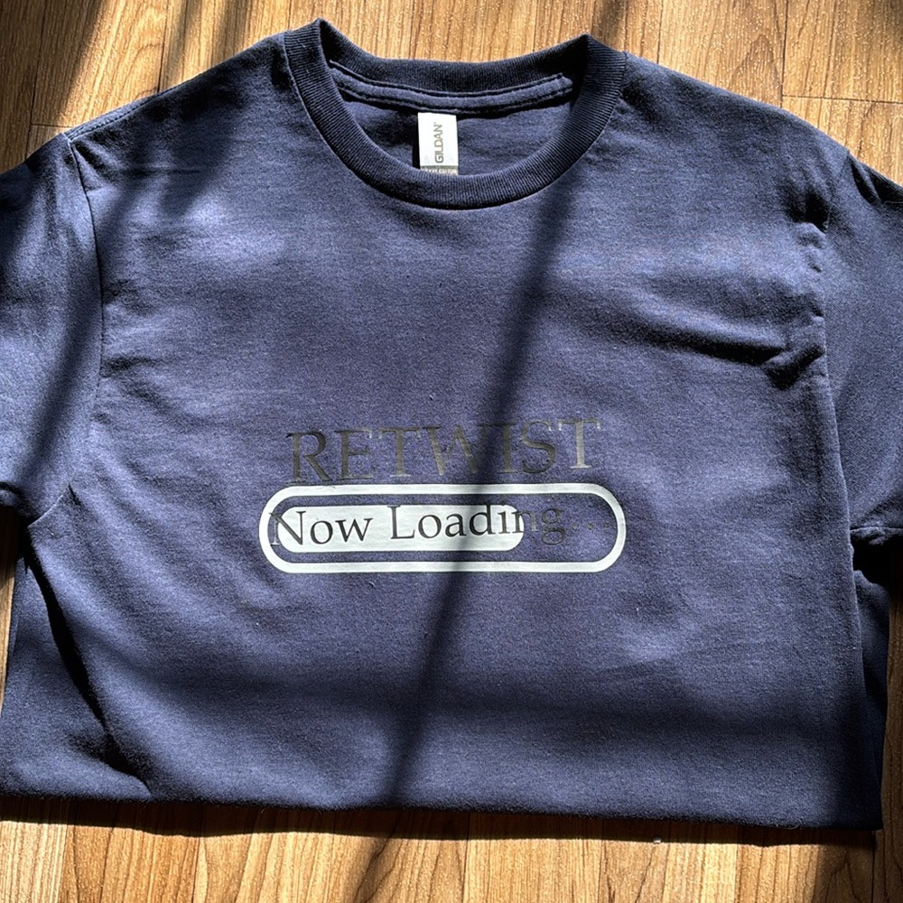 “Retwist now loading” tee